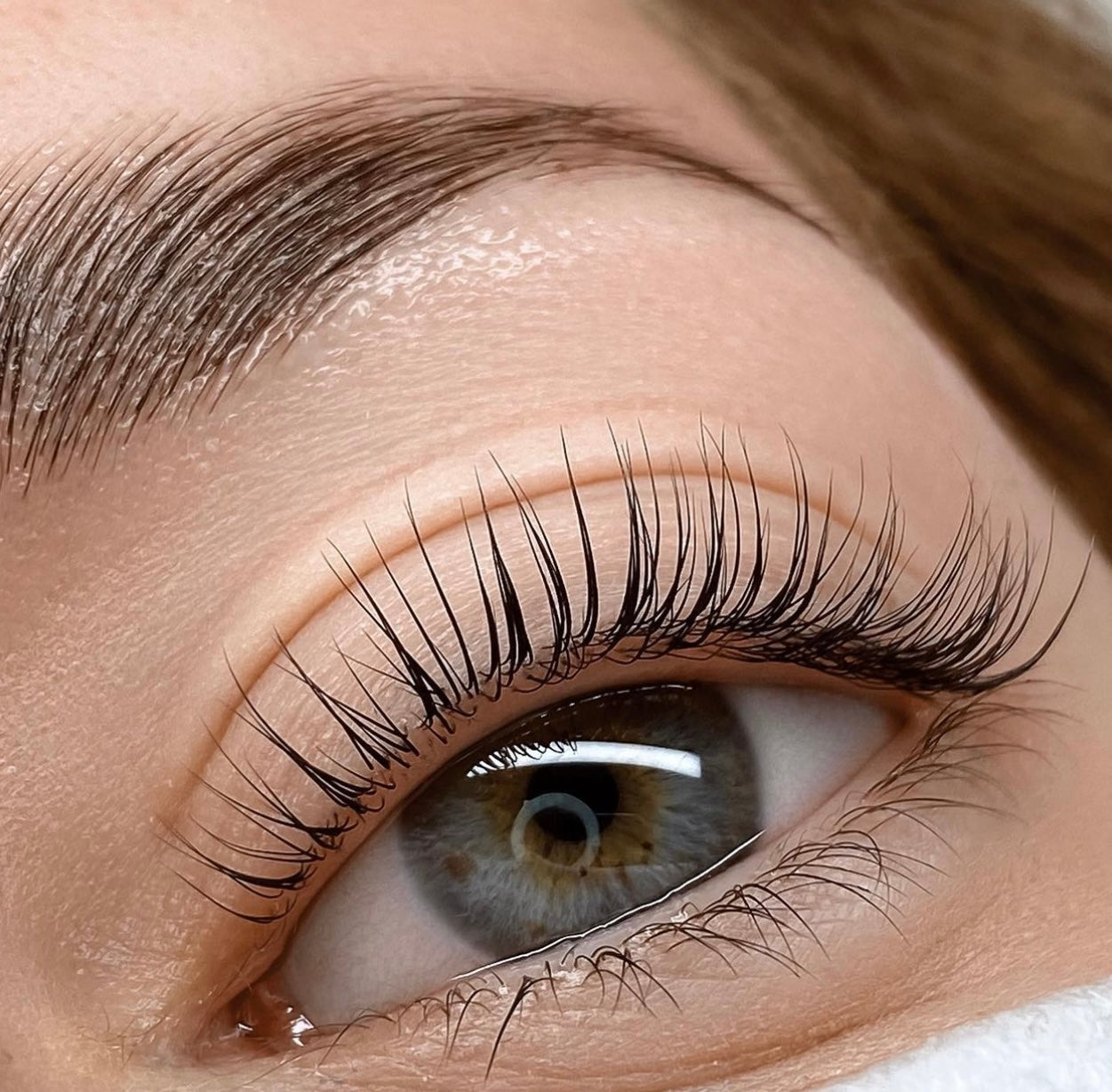 Should I tint my lashes before getting eyelash extensions done?
